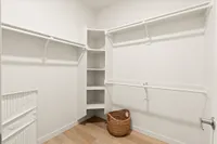 Large Walk-In Closet with Built-In Storage