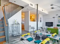 The spacious dining layout offers a refined setting for hosting dinner parties and entertaining friends in style. | Watch Factory Lofts | Watch Factory Lofts Apartments