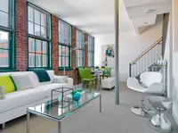 Beautiful and large windows in apartment at Watch Factory Lofts apartments in Waltham, MA.| Watch Factory Lofts | Watch Factory Lofts Apartments