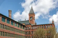 A charming residential facade offers a unique blend of vintage character and modern luxury in a peaceful setting. | Watch Factory Lofts | Watch Factory Lofts Apartments
