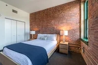 Your roomy bedroom provides ample square footage with comfortable proportions for sleeping and storage. | Watch Factory Lofts | Apartment in,Waltham MA
