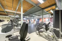 Customize your workout with our diverse exercise equipment in fitness center ranging from cardio machines to free weights and functional training tools. | Watch Factory Lofts | Watch Factory Lofts Apartments