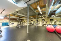 Build strength and endurance in our community fitness center where neighbors come together to pursue their health and fitness journeys. | Watch Factory Lofts | Watch Factory Lofts Apartments