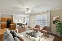 Enclave on Golden Triangle Open Concept Floor Plan with a view of the Kitchen, Dining Table Area, and Living Room