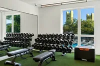 Elevate your workout in our well-equipped fitness center overlooking the pool at 805 Riverfront in Sacramento with City View