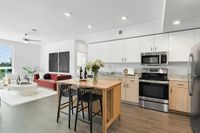 Experience modern comfort in this stylish open-concept apartment.