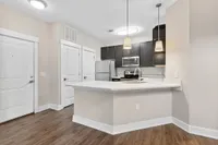 Kitchen with Pantry at Cottonwood Reserve Apartments
