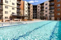 Resort-Style Pool and Hot Tub at Current Apartments