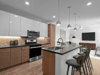 1 Bedroom Apartment Living Room and Kitchen at Sugarmont Apartments in Sugarhouse Utah