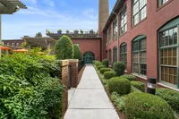 Alpha Mill Entrance from Pool Exterior Daytime