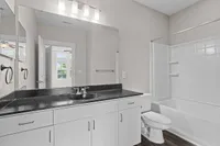 Garden Style Bathroom at Alpha Mill Apartments in NODA Charlotte