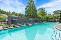 Resort-Style Pool and Lounge Chairs and Sundeck at Retreat at Peachtree Apartments