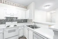 Fully Equipped Kitchen at Lake St James Apartments