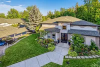 Charming suburban home with lush landscaping, vibrant flower gardens, and inviting curb appeal nestled in a serene neighborhood at Scott Mountain Apartments in Portland OR.