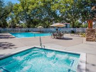 Relax by the resort-style pool and soak up the Salt Lake City sunshine at Fox Point in Old Farm Apartments