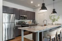 Fully Equipped Kitchens with Spacious Islands