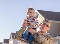 soldier with baby