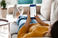 Resident Portal App Girl using phone