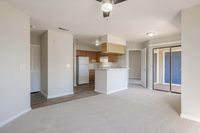 Experience modern living in this open-concept apartment with a charming kitchen and a private balcony.