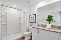 Elegant bathroom with white finishes at a home for rent in Apopka, Florida.