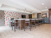 Modern community kitchen and gathering bar.