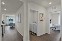 Functional layout with in-home laundry and flex room.