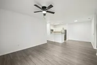 interior pic of deluxe unit with gray planking and white walls