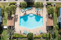 Aerial view of the resort-style swimming pool and sundeck.