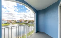 Private balcony with serene water views.