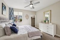 Bedroom with Ceiling Fam and Walk In Closet