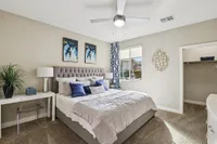 Carpeted Bedroom with Walk In Closet