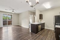 Kitchen and Bar Area with Pendant Lighting