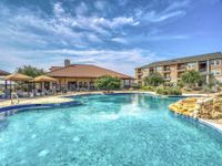 Pool Area with Exterior Buildings | Apartments Midland TX | Advenir at Mayfield