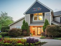 Apartment community clubhouse exterior.