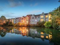 Evening apartment community view from the lake