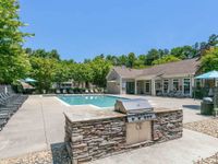 Gas grills, overlooking the pool