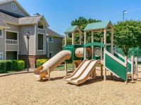 Community outdoor playground with slides