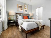 Large Bright Bedroom, Wood Flooring