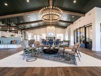 Interior of clubhouse, with seating around, modern barn-style