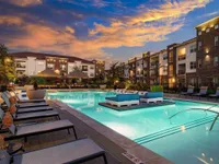 Swimming pool with lots of chaises
