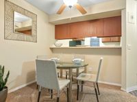 Open concept layout kitchen and living room homes for rent in Aurora.