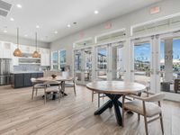 Clubhouse with kitchenette and ample seating area.