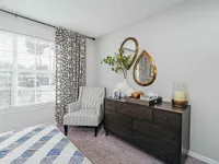 Step into tranquility with this beautifully designed bedroom, perfect for relaxation and comfort.