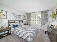 Experience the comfort and style of this beautifully designed bedroom, offering a serene retreat.
