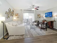 Step into elegance and comfort in this beautifully designed living room, perfect for relaxation and entertainment.
