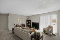 Advenir at The Meadows - Cozy Living Room