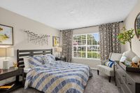 Advenir at The Oaks - Cozy Bedroom