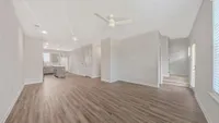 Living room with a separate dining room.