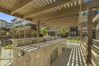 Outdoor Fireplace and Seating | Towers at Mercer Crossing | Apartments In Farmers Branch Texas