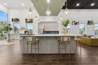 Modern open-concept kitchen with island in Denton TX rental home near University of North Texas